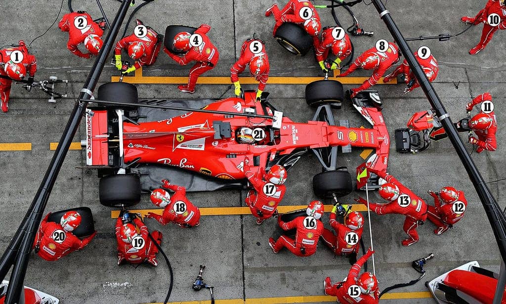 Formula 1 team working on race car